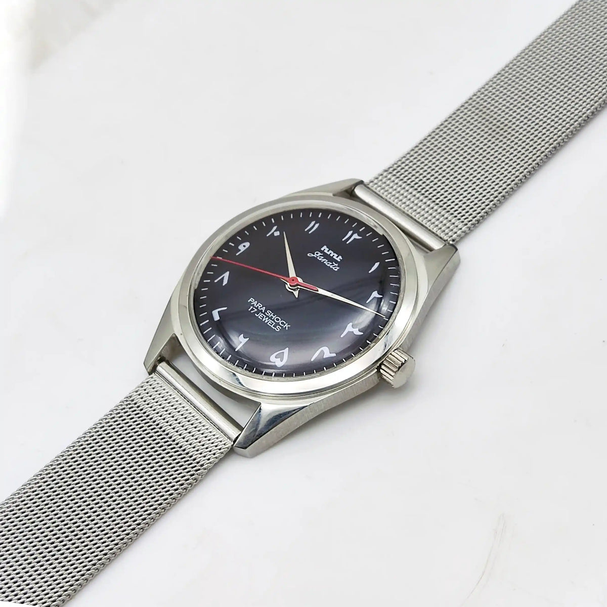 HMT Janata Handwinding Men's Watch with Black Dial Arabic Font and Transparent Back, 17 Jewels