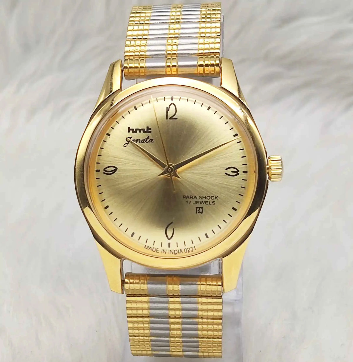 HMT Janata Men's Watch - Handwinding Para Shock 17 Jewels with Golden Dial and Transparent Back