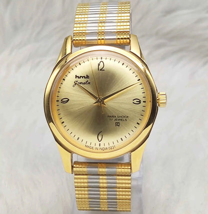 HMT Janata Men's Watch - Handwinding Para Shock 17 Jewels with Golden Dial and Transparent Back