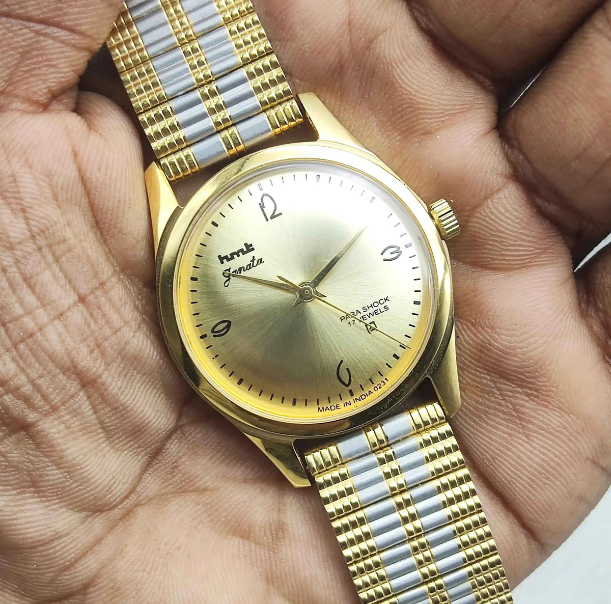 HMT Janata Men's Watch - Handwinding Para Shock 17 Jewels with Golden Dial and Transparent Back