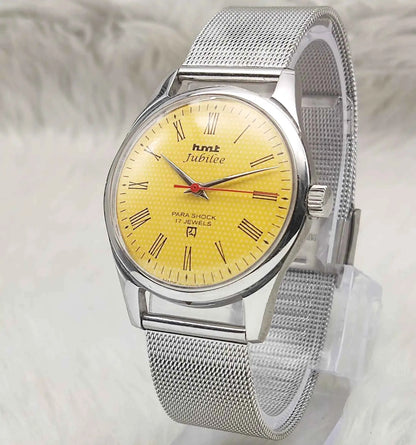 HMT Jubilee Handwinding Watch with 17 Jewels and Sun Yellow Dial featuring Roman Numerals Indices
