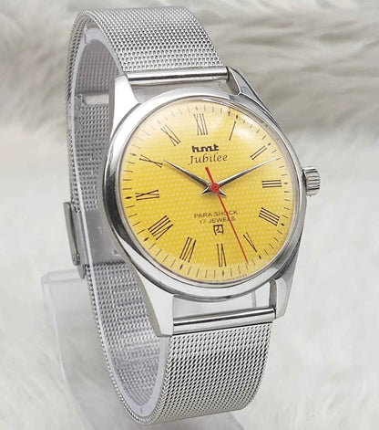 HMT Jubilee Handwinding Watch with 17 Jewels and Sun Yellow Dial featuring Roman Numerals Indices