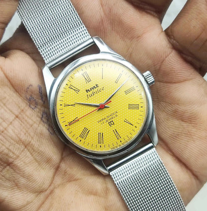 HMT Jubilee Handwinding Watch with 17 Jewels and Sun Yellow Dial featuring Roman Numerals Indices
