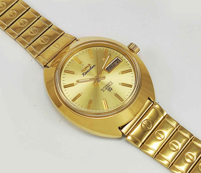 HMT Kanchan Para Shock Watch - Timeless Mechanical Luxury with Golden Dial
