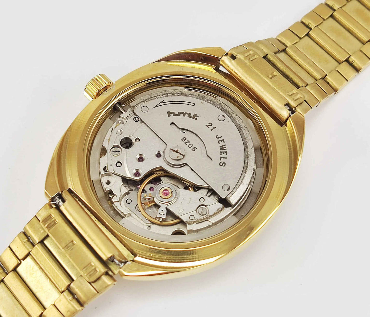 HMT Kanchan Para Shock Watch - Timeless Mechanical Luxury with Golden Dial