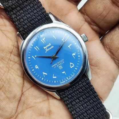 HMT Janata Handwinding Watch with 17 Jewels and Ocean Blue Dial in Arabic Font