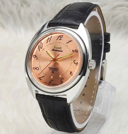 HMT Kohinoor Orange Dial Watch with Handwinding and Transparent Back