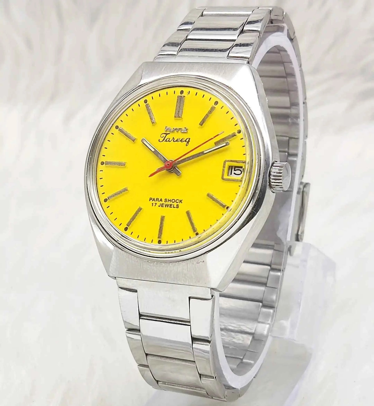 HMT Tareeq Men's Watch with Yellow Dial, 17 Jewels, Stick Indices, and Date Features