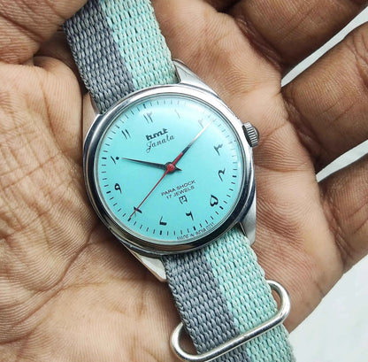 HMT Janata Men's Watch - Turquoise Dial Arabic Font Mechanical Handwinding 17 Jewels Para Shock