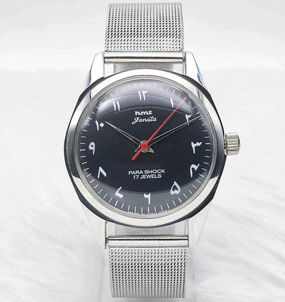 HMT Janata Handwinding Men's Watch with Black Dial Arabic Font and Transparent Back, 17 Jewels