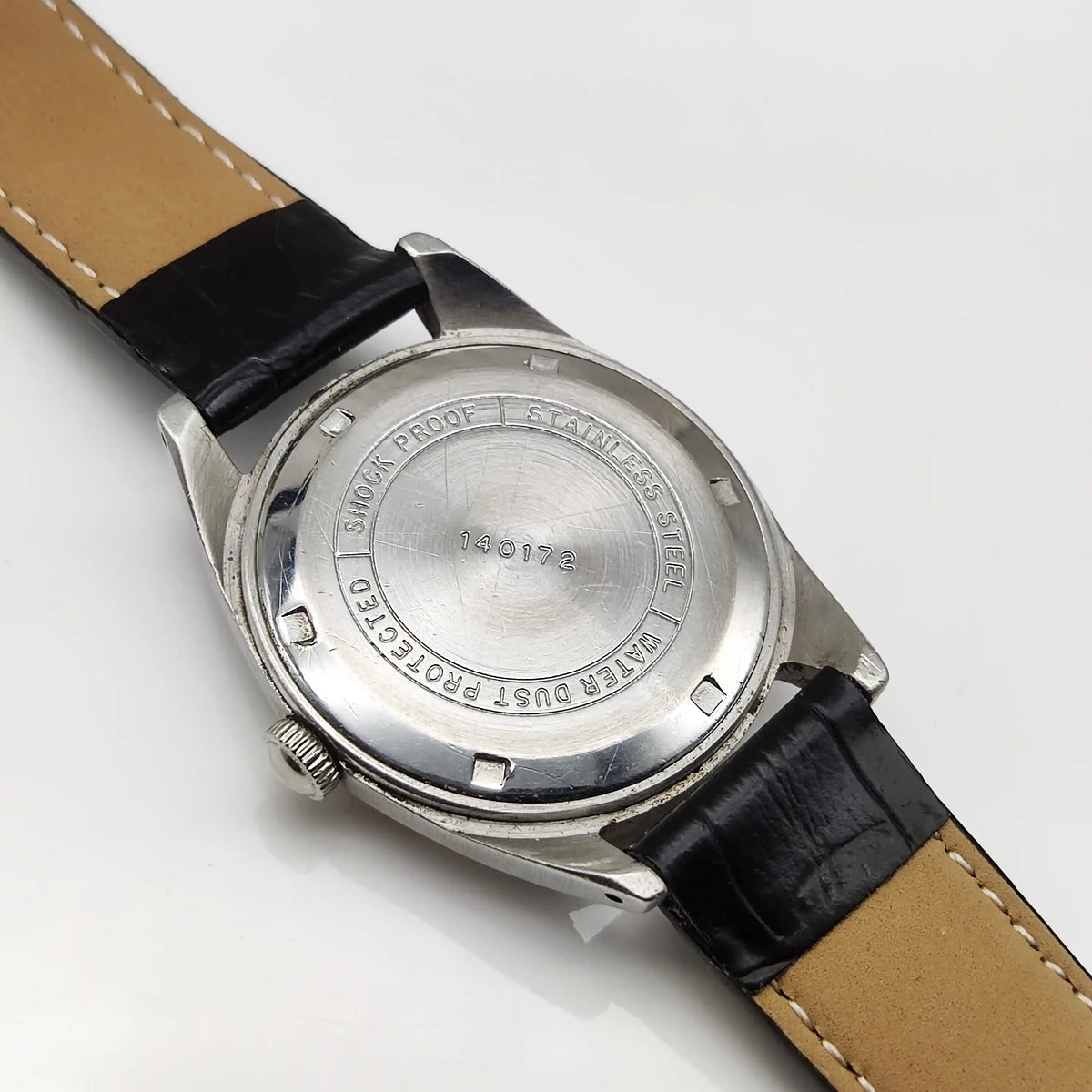 HMT Janata Stick Watch – Timeless Reddish Dial with Handwinding Precision