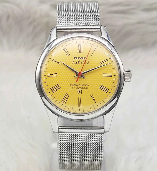 HMT Jubilee Handwinding Watch with 17 Jewels and Sun Yellow Dial featuring Roman Numerals Indices