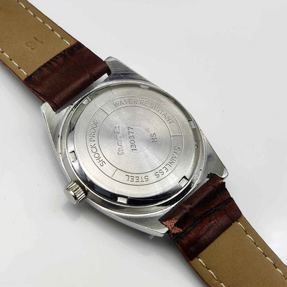 HMT Kohinoor Handwinding Watch - Timeless Precision with Orange Dial and 17 Jewels