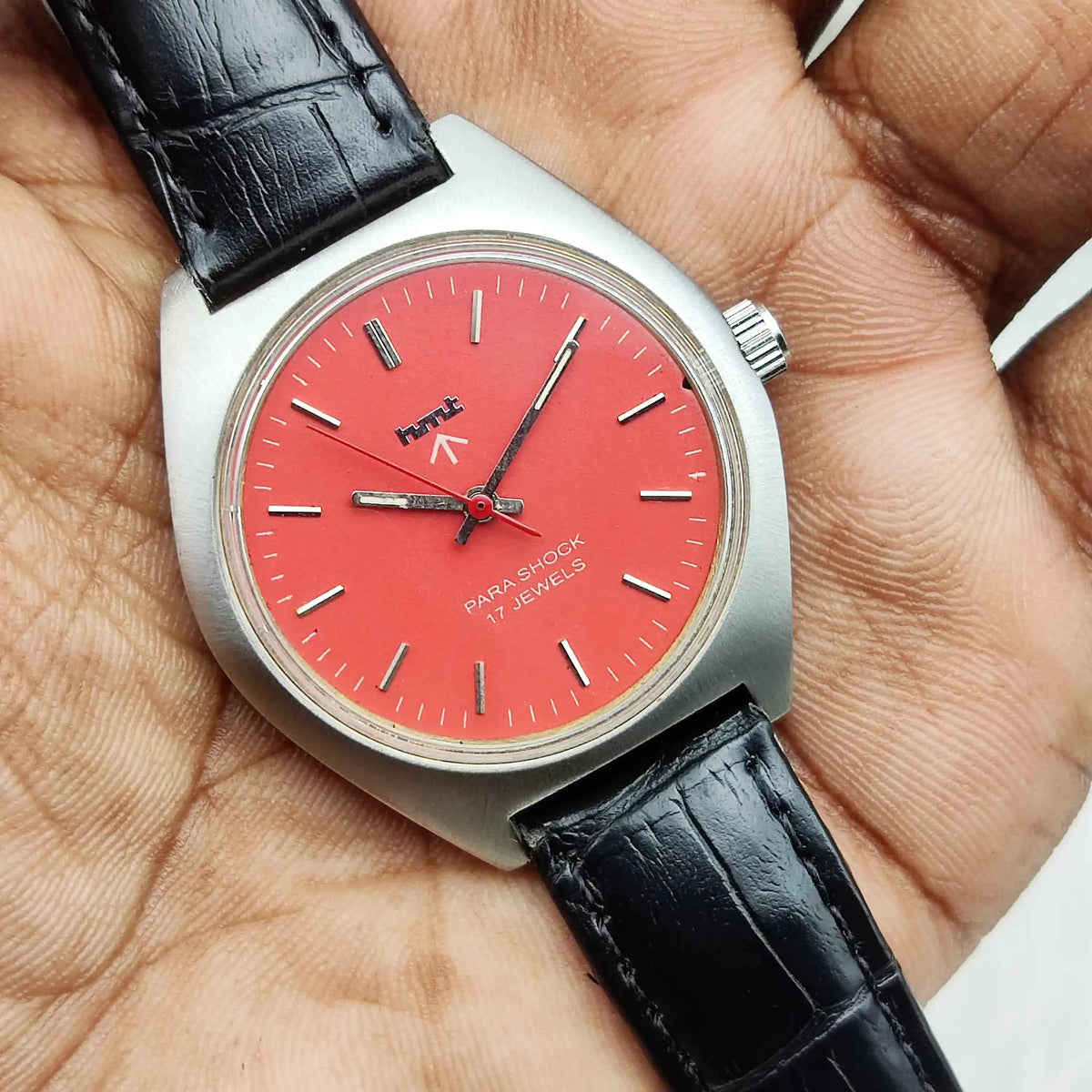 HMT Red Dial Handwinding Watch with 17 Jewels Para Shock Mechanism